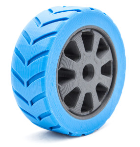 Dual head print: a flexible tyre with a solid rim